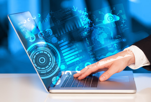 Modern notebook computer with future technology media symbols