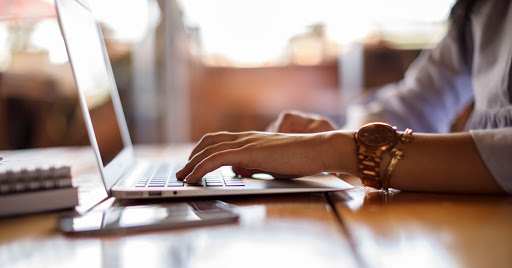 Female student checking her computer