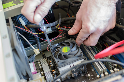 Technician repairing a computer